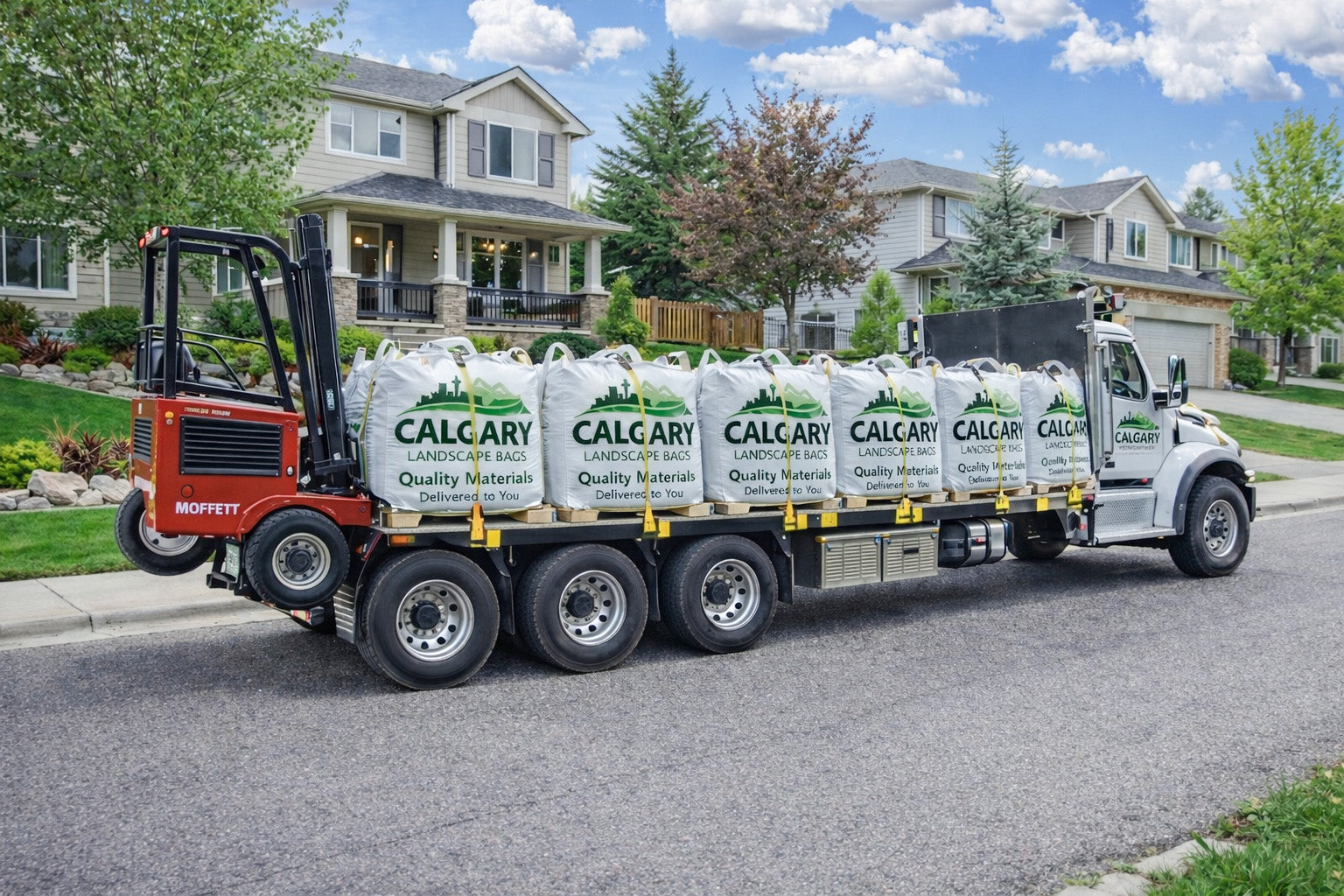 Bulk landscape bags filled with decorative rock and gravel for residential landscaping projects in Calgary