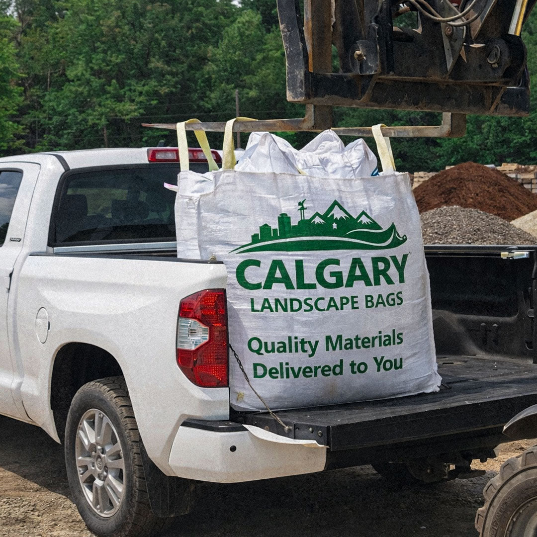 Decorative rock, gravel, and sand bulk landscape bags for residential landscaping projects in Calgary